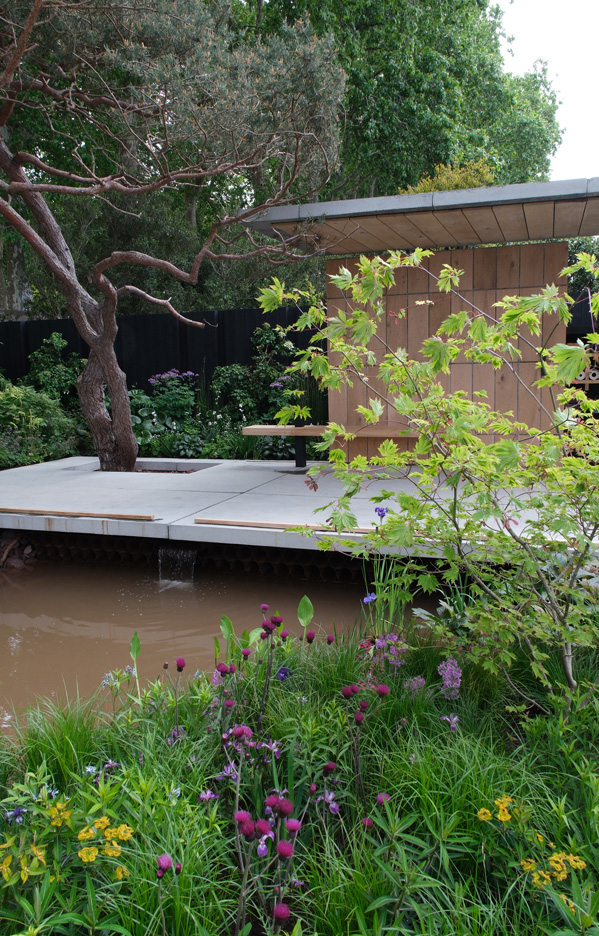 platform seating area in garden over water