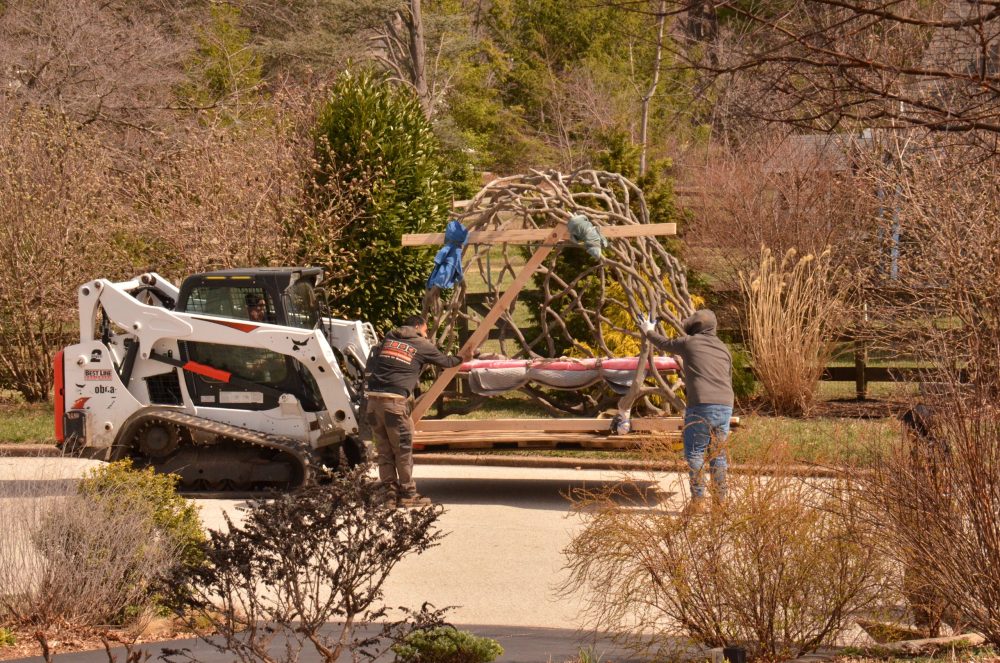 faux bois sculpture being loaded on pallet