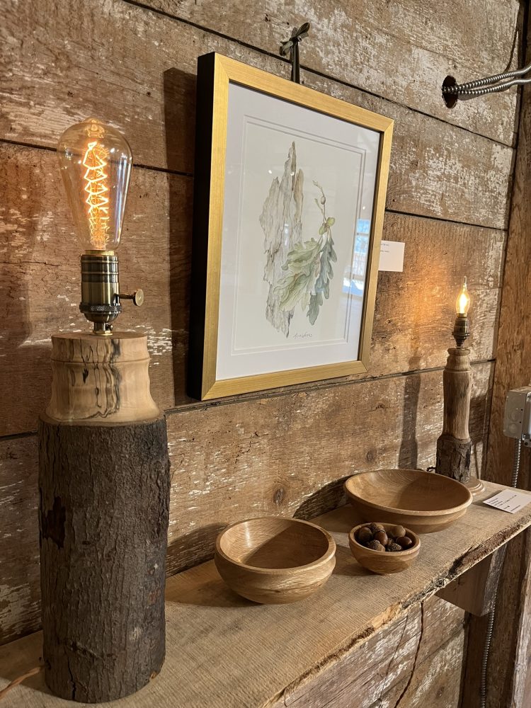 wooden bowls and candle holders with framed picture of oak leaf