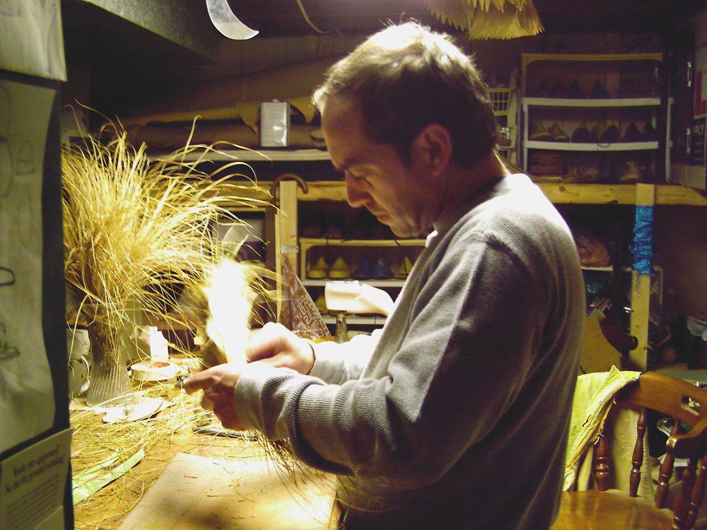 Man making shoes