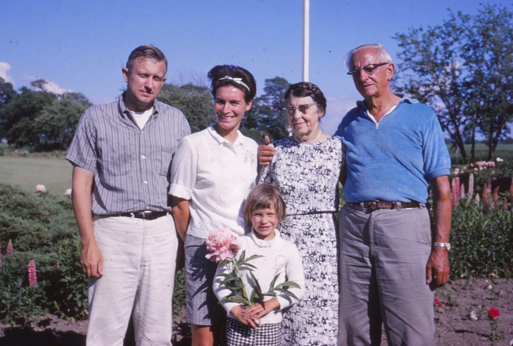 Verhake Family portrait early 1960s with young carol holding pink peony